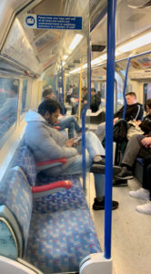 Passengers on a Piccadilly Line tube.