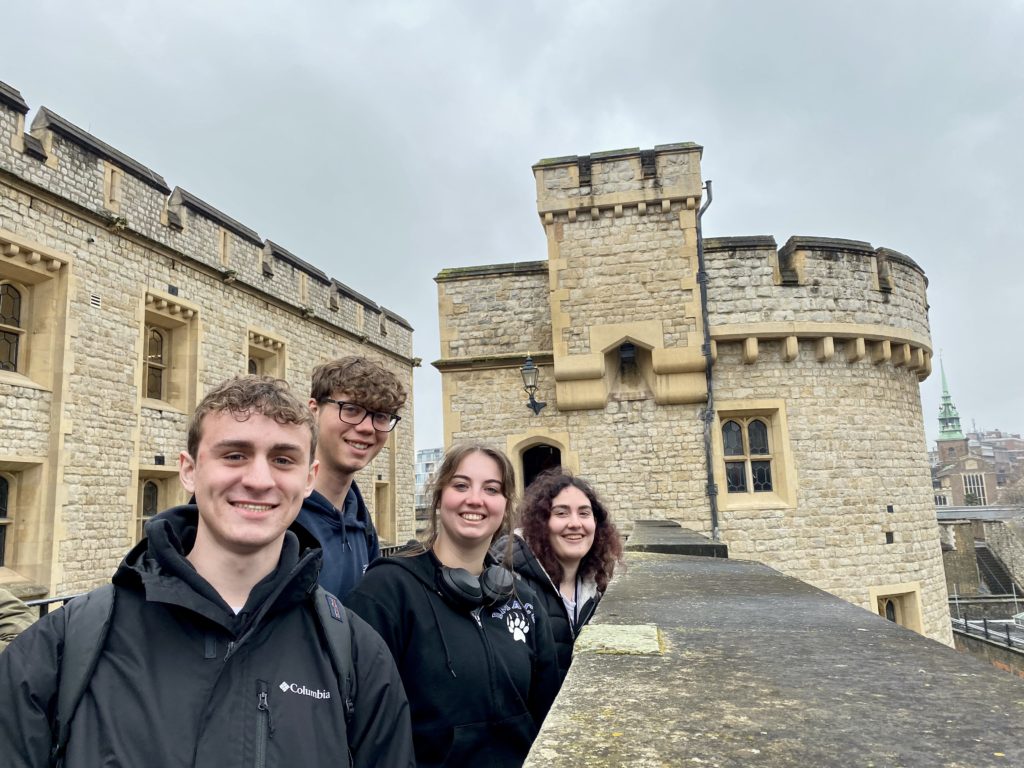 DMACC students Dayton, Dylan, Allison M, and Hayley walk the battlements at the Tower of London